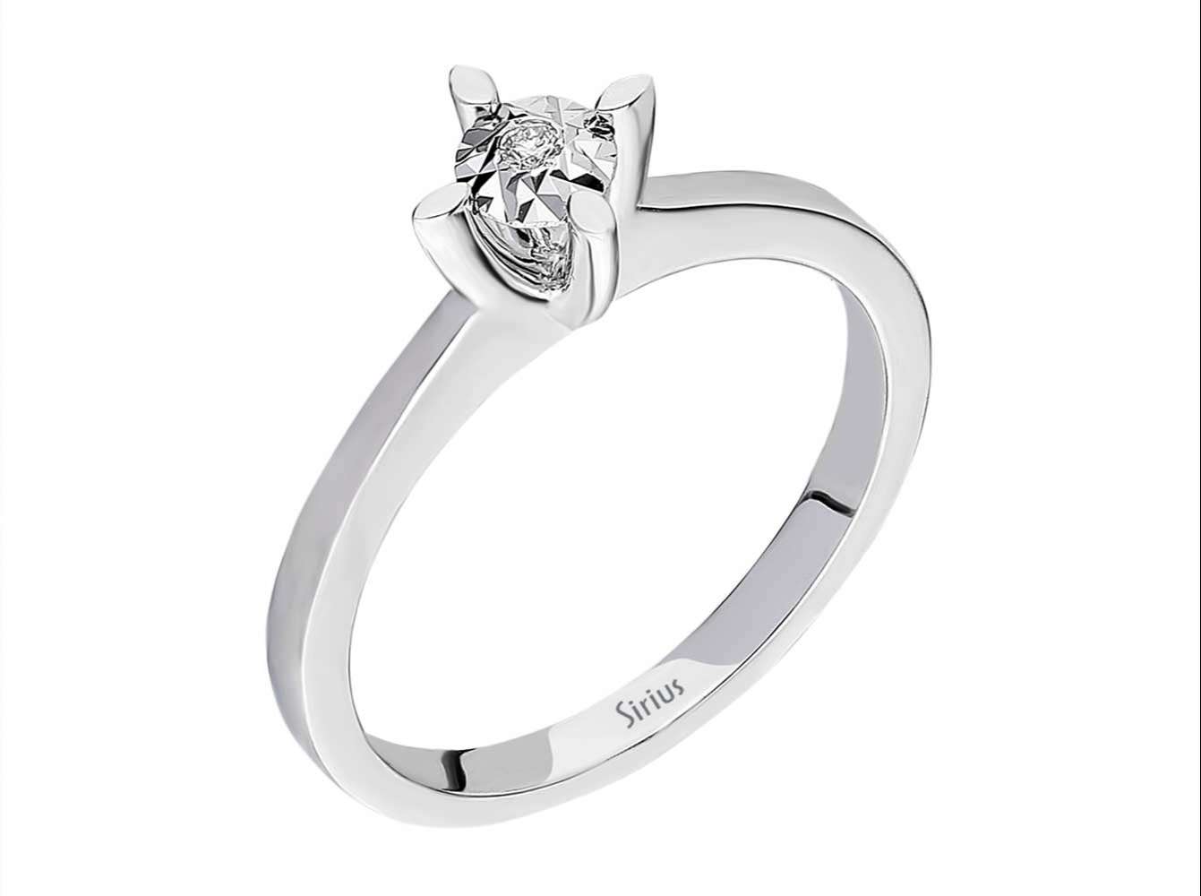 Subtle solitaire ring with 0.02 carat round diamond, 8 carat white gold