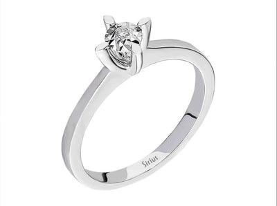 Subtle solitaire ring with 0.02 carat round diamond, 8 carat white gold