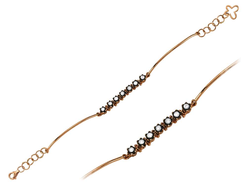 Elegant bangle with 7 round diamonds in rose gold – 8K