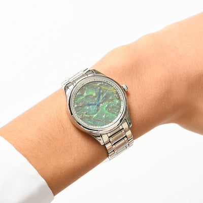 Green abstract clock for women