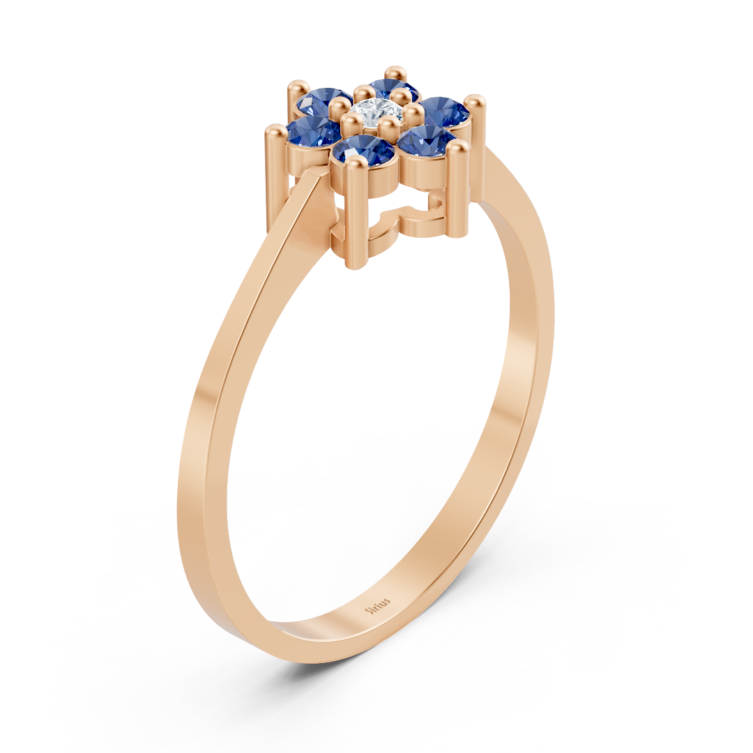 Bague fine en or rose avec saphirs et diamant