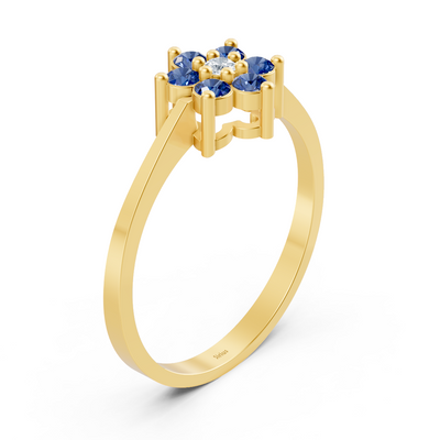 Delicate yellow gold ring with sapphires and diamond