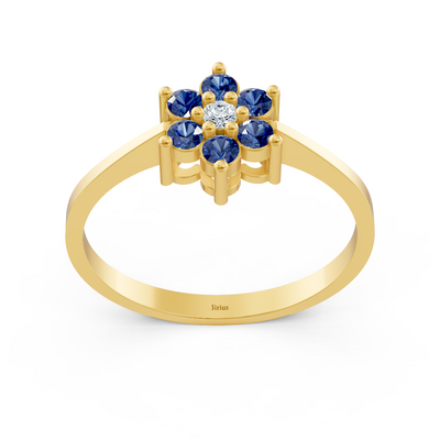 Delicate yellow gold ring with sapphires and diamond