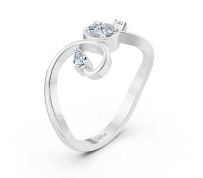 Weißgoldener Ring mit Marquise-, Princess- und Pear-Schliff