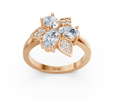 Rose gold ring with three oval lab diamonds and floral design