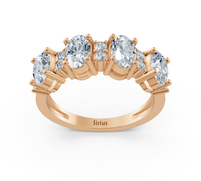 Rose gold multi-stone ring with oval and round lab diamonds