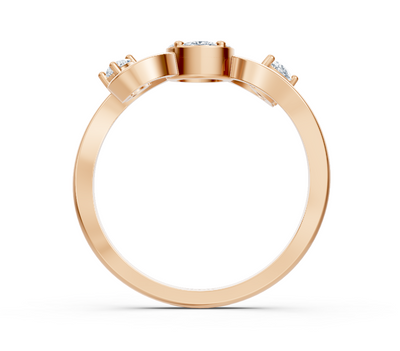 Rose gold ring with marquise, princess, and pear cut