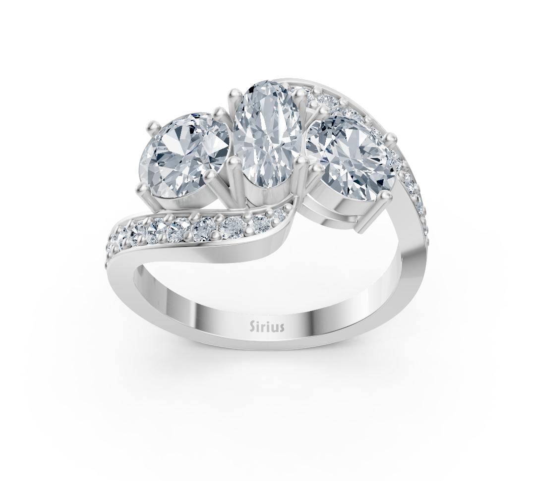 Rosy Lab Diamonds'ın Beyaz Altın Sirius üç taşlı yüzüğü; oval ve yuvarlak pırlantalarla sunulan yüksek kaliteli Mücevher