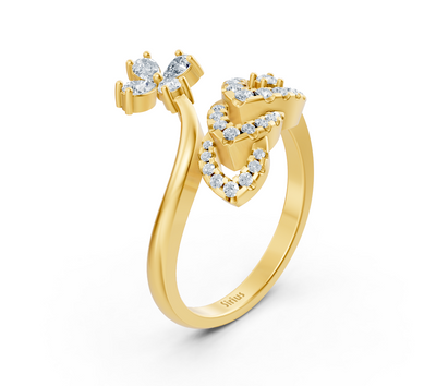 Yellow gold double heart ring with pear and round diamonds