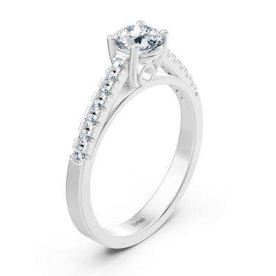 Fine white gold ring with graduated lab diamonds and solitaire