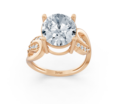 Verlobungsring aus Roségold mit ovalem Labordiamanten und geschwungener Ornamentfassung