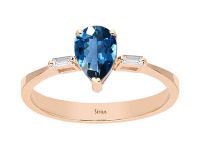 Royal blue topaz ring with baguette diamonds in 14K rose gold
