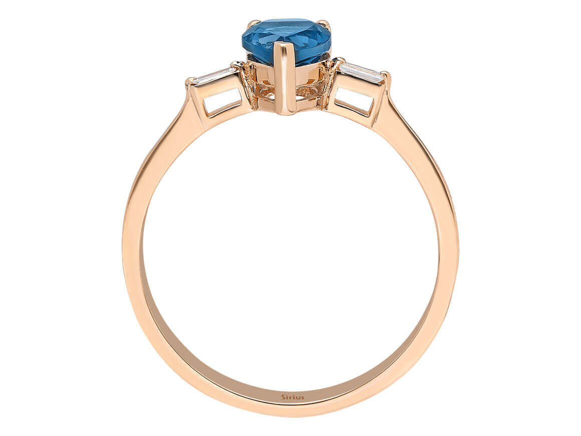 Royal blue topaz ring with baguette diamonds in 14K rose gold