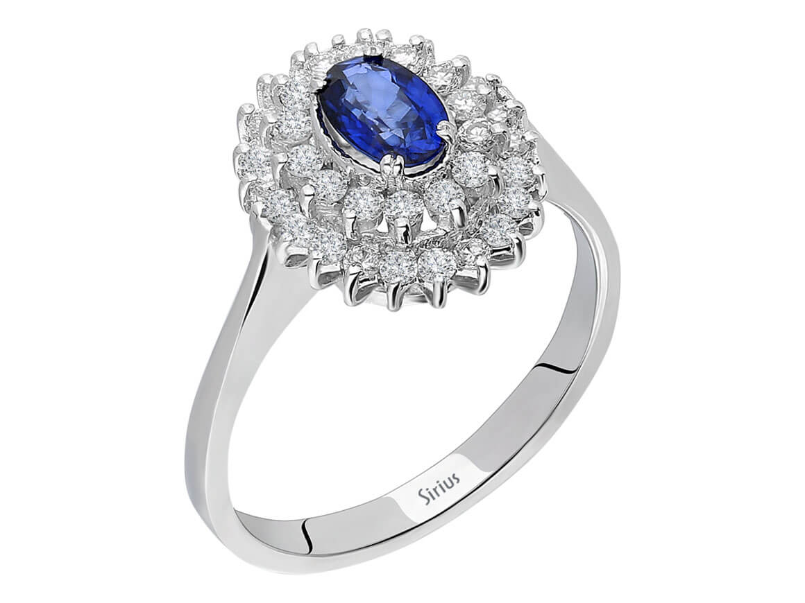 Double-row 14 Karat white gold ring with 36 round diamonds and oval sapphire