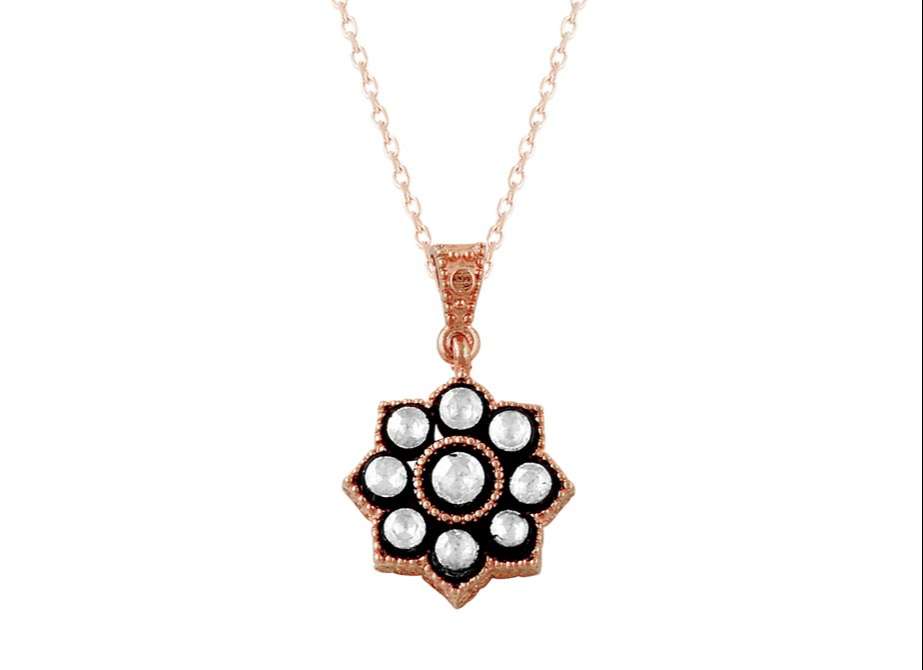 Strahlenförmiger Anhänger mit 9 Altschliff-Diamanten in 8K Roségold