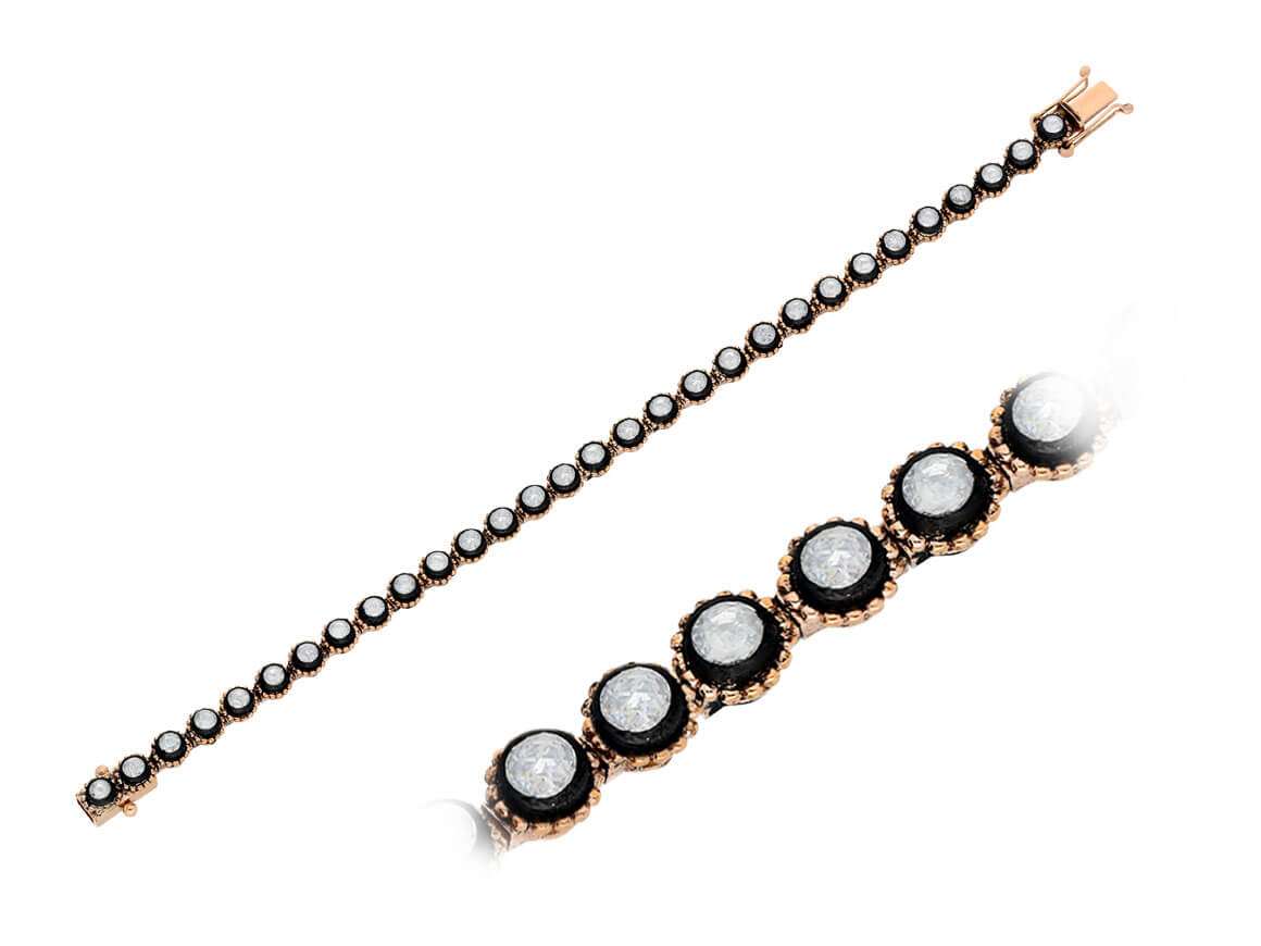 Vintage-inspiriertes Armband mit 30 lab-grown Diamanten in 8K Roségold – schwarzer Rahmen