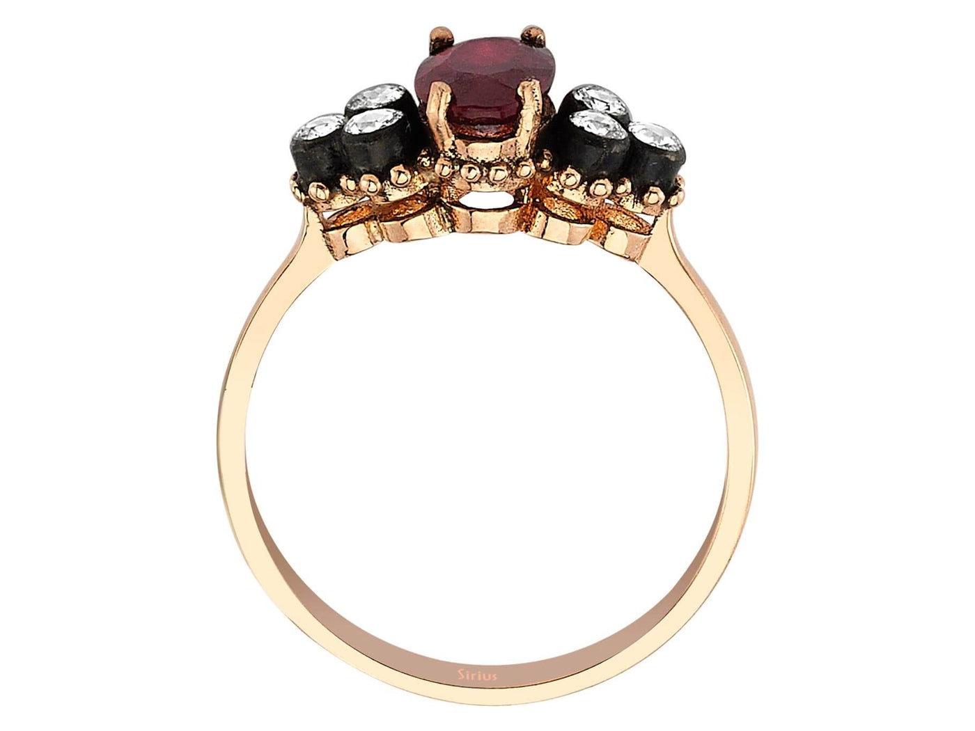 Elegant ring with oval ruby and six round diamonds in rose gold