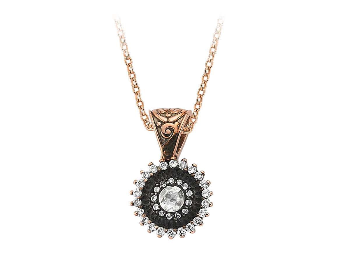 Rose gold pendant with central lab diamond and brilliant halo