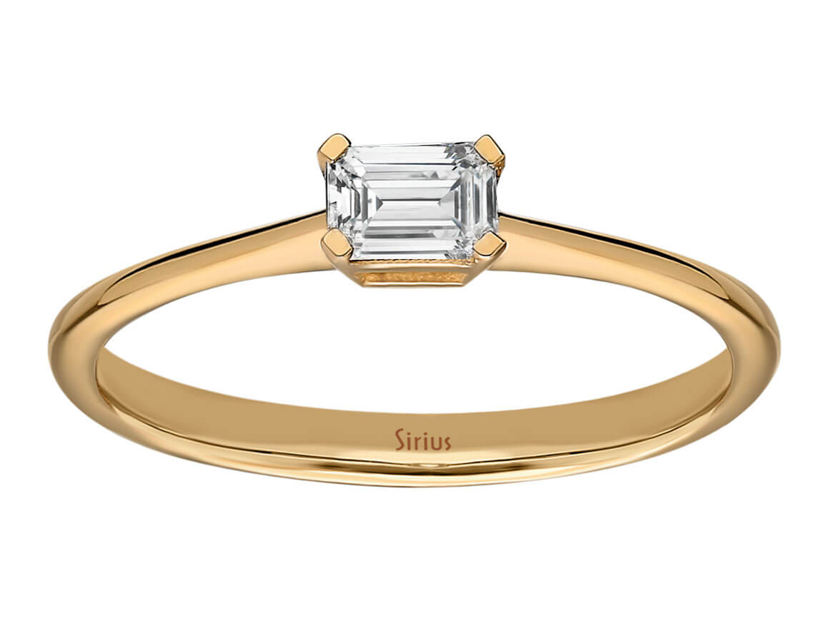 Rose gold ring with emerald-cut diamond