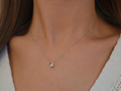Solitaire diamond necklace with leaf setting in 14K white gold – 0.18 carat
