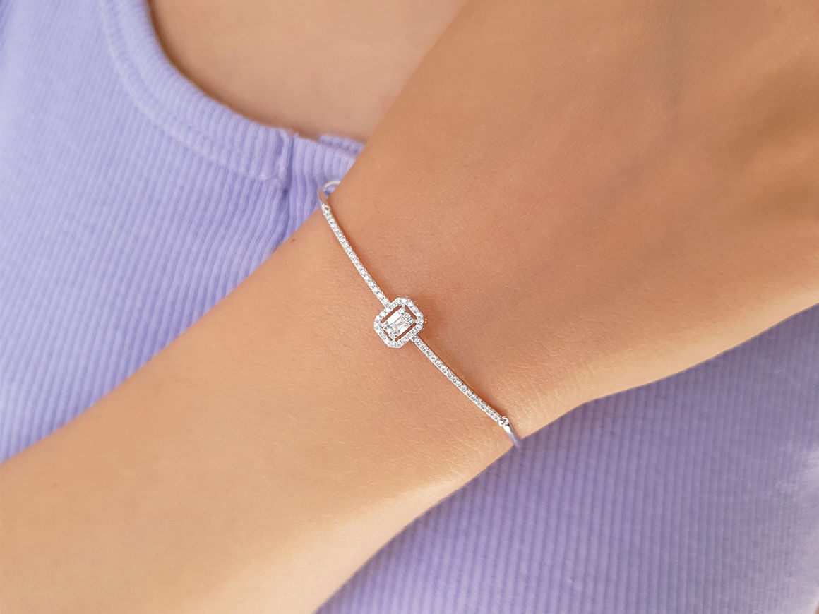 Fine bangle bracelet with 3 baguette & 60 round lab-grown diamonds in 8K white gold