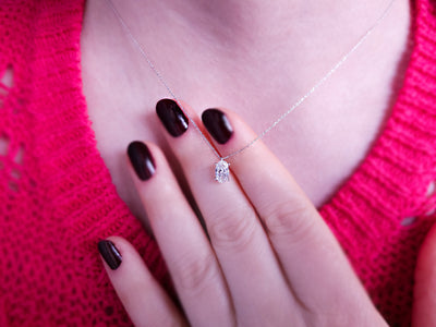 Oval solitaire pendant with 0.70 carat lab diamond in 14K gold