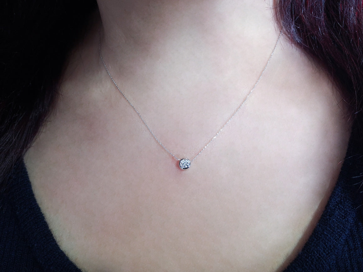 Minimalist solitaire diamond necklace in 14K white gold