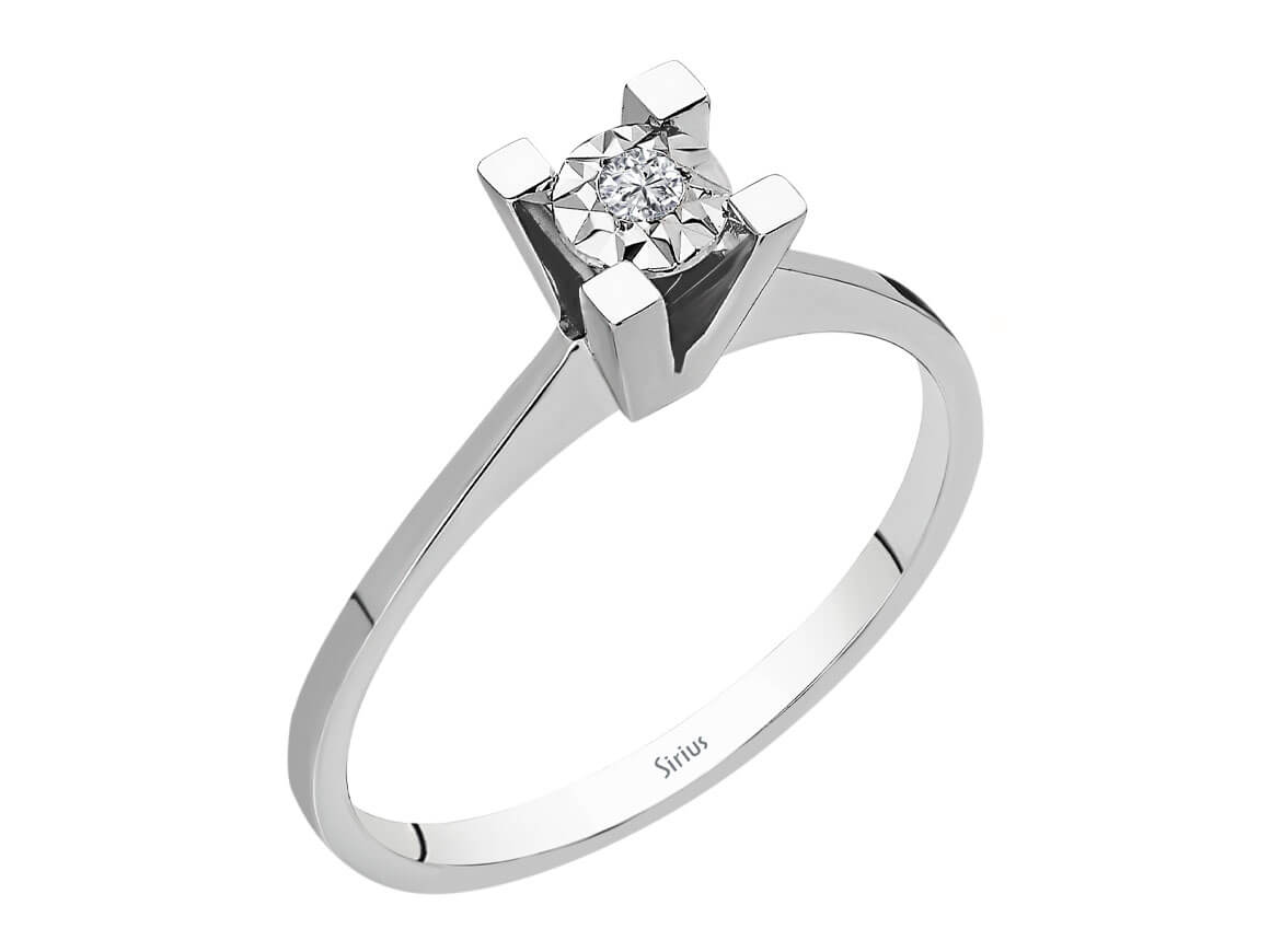 Minimalist white gold solitaire ring with sparkling diamond