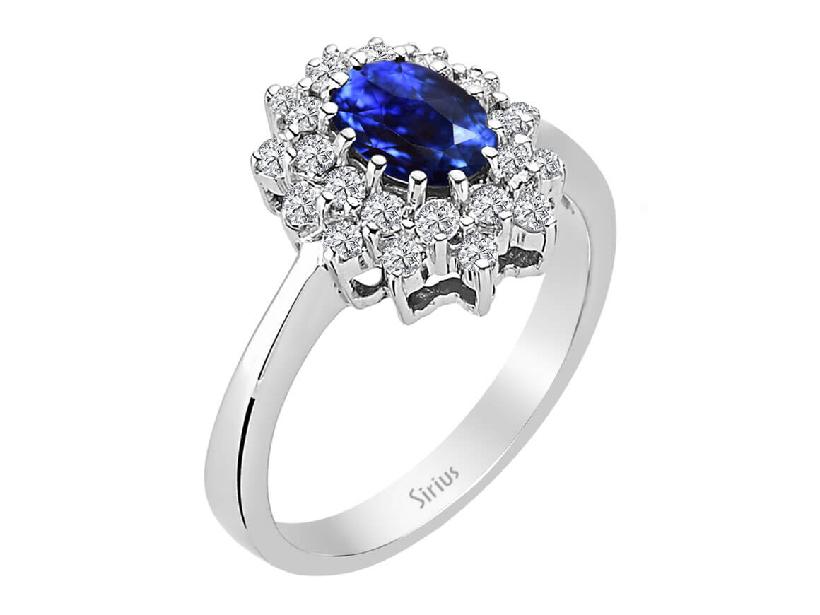 Eleganter Ring mit ovalem Saphir und 24 laborgezüchteten Runddiamanten in 14 Karat Weißgold