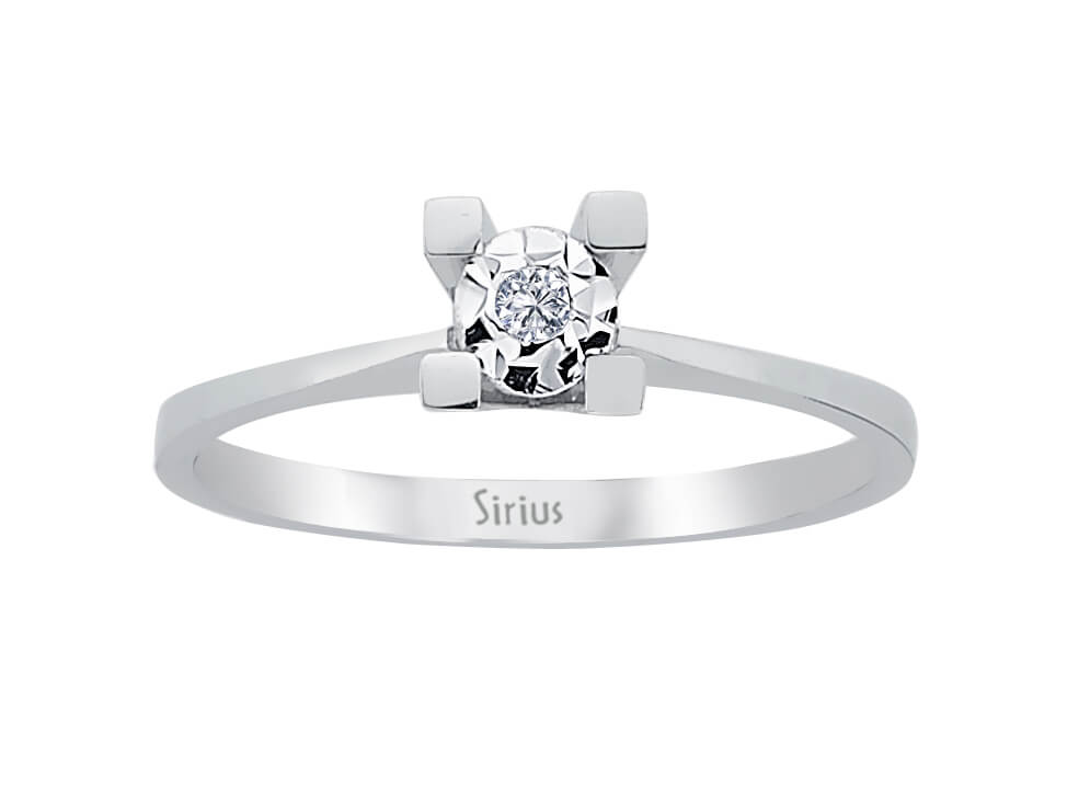 Simple white gold solitaire ring with sparkling diamond