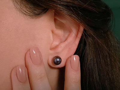 Clous d'oreilles avec perles noires en or rose 585