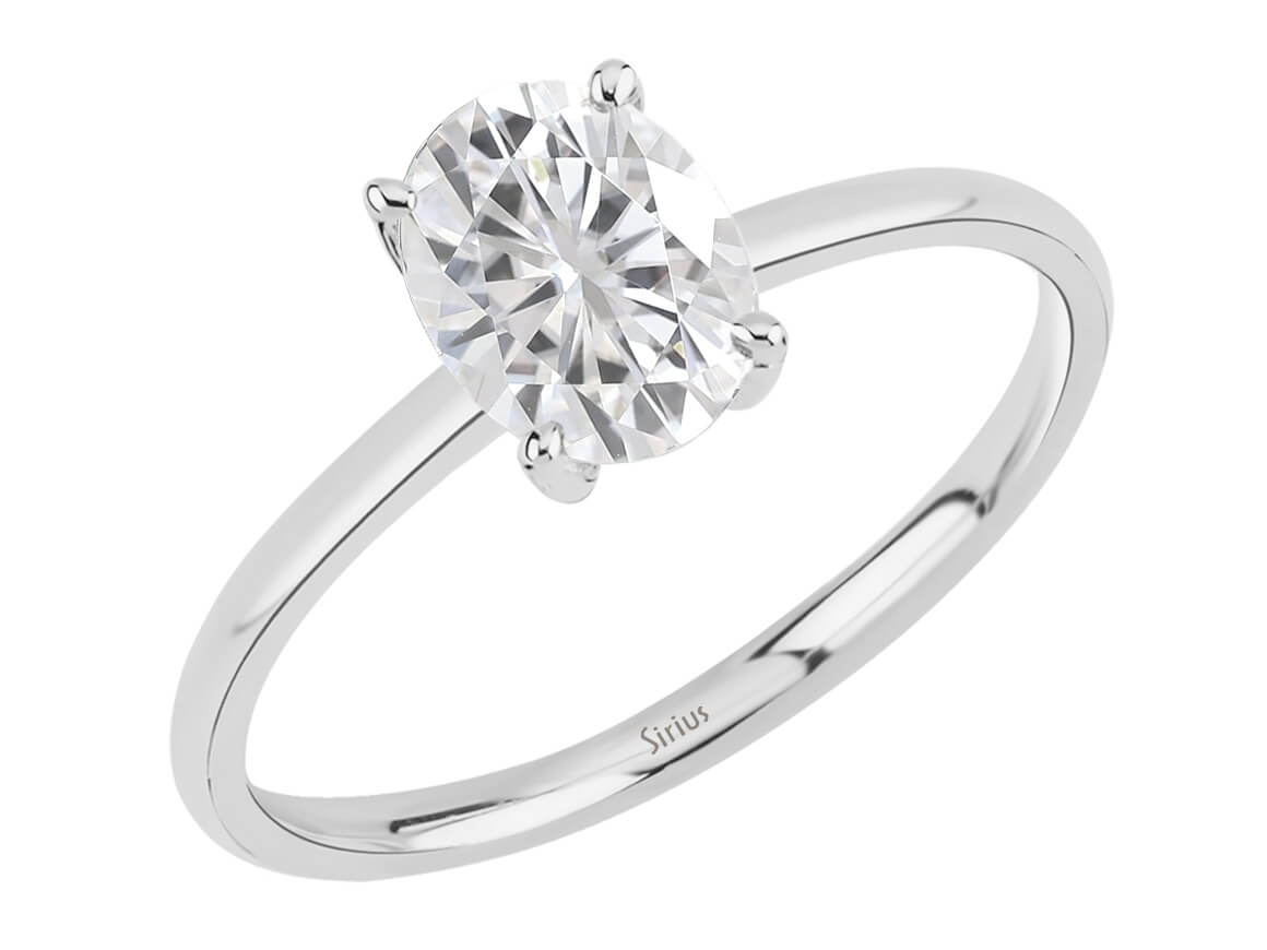 Simple solitaire ring with 1.60 ct oval white topaz in white gold