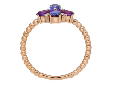 Rose gold ring with amethyst, iolite, and diamond setting