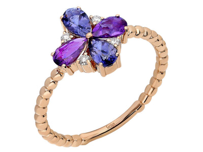 Rose gold ring with amethyst, iolite, and diamond setting