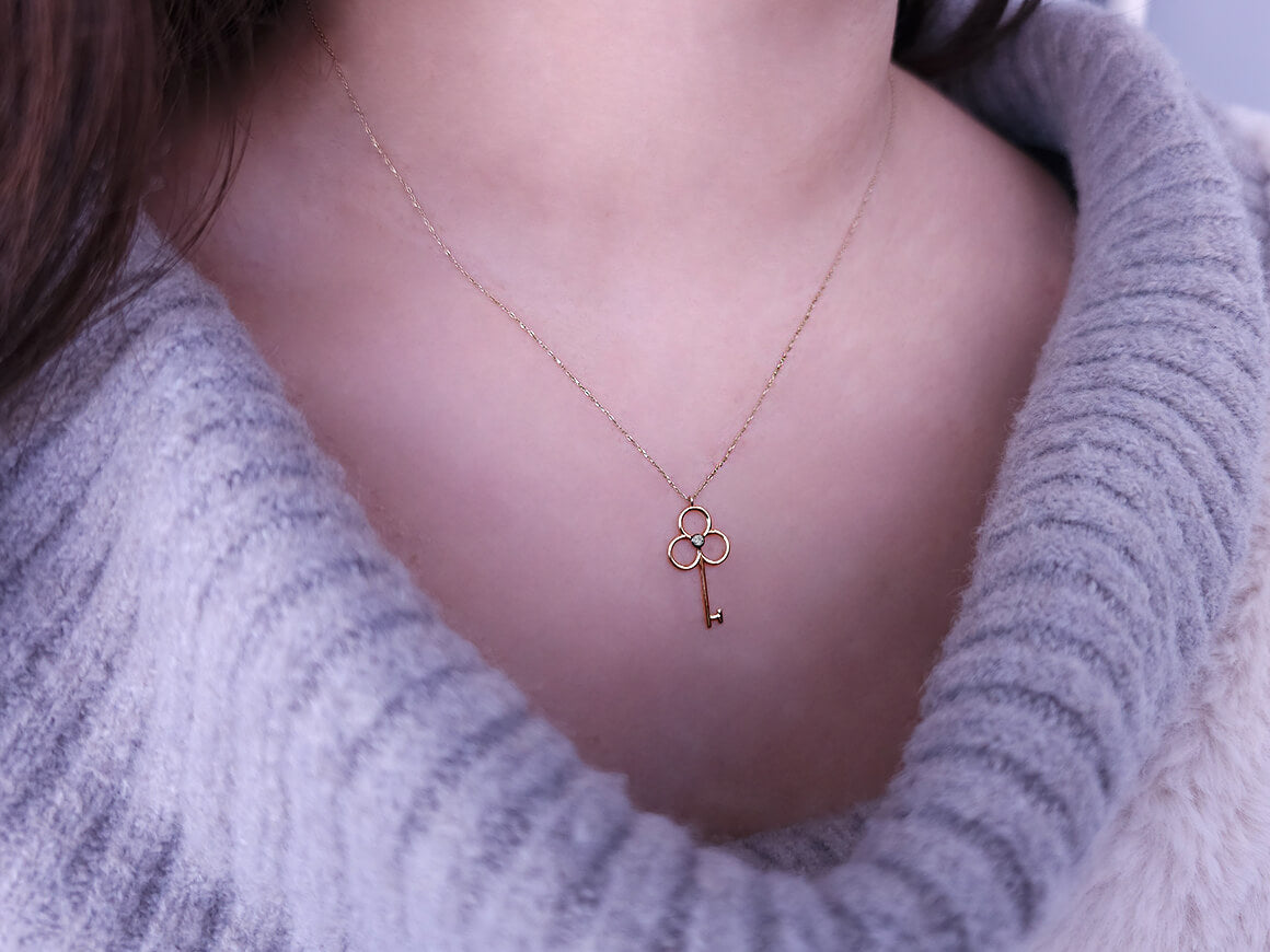 Magical key pendant with lab diamond in 14K yellow gold