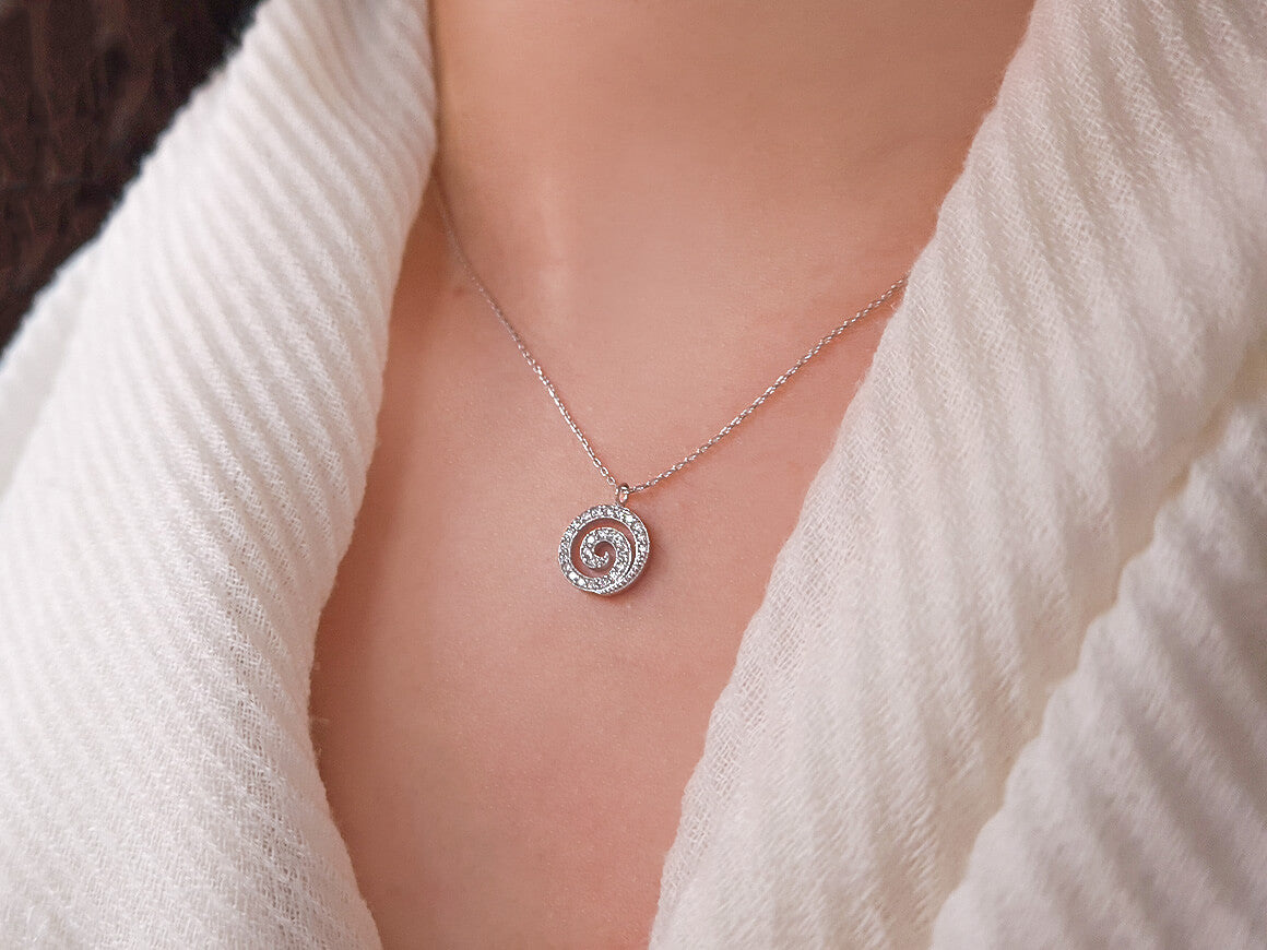 Spiral pendant with diamonds | 14K white gold