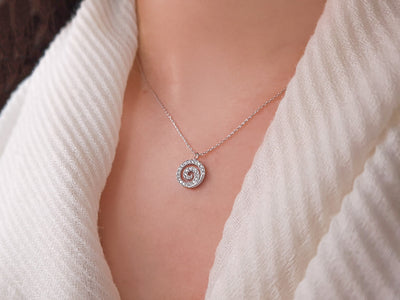Spiral pendant with diamonds | 14K white gold