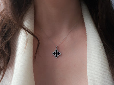 Cross-shaped enamel pendant with laboratory diamond setting