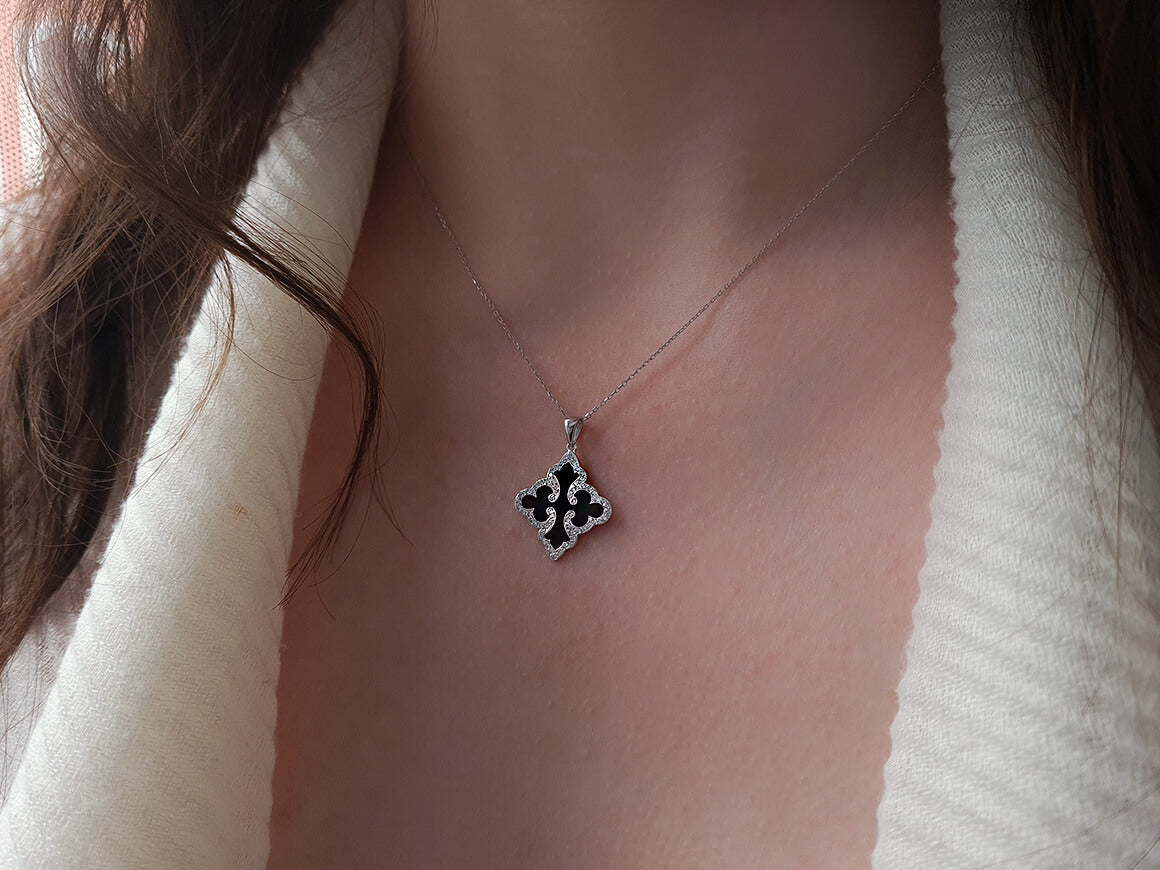 Cross-shaped enamel pendant with laboratory diamond setting
