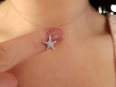 Starfish pendant with 26 diamonds made of 18K white gold