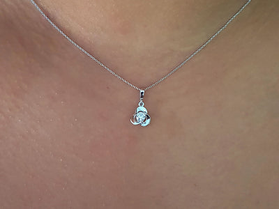 Flower-shaped solitaire pendant with diamond in 14K white gold