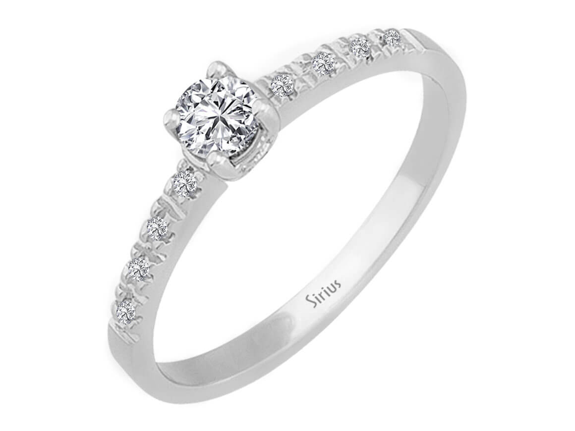 Elegant solitaire ring with a 0.23 ct center diamond and 8 small lab-grown diamonds in 14K White Gold—high-quality Jewelry from Rosy Lab Diamonds