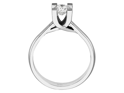 Simple solitaire ring with round diamond in white gold