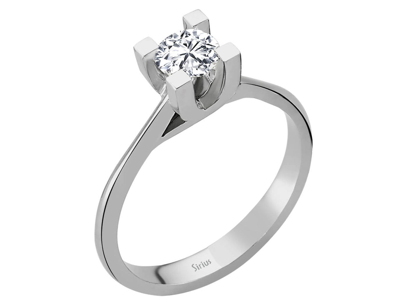 Simple solitaire ring with round diamond in white gold