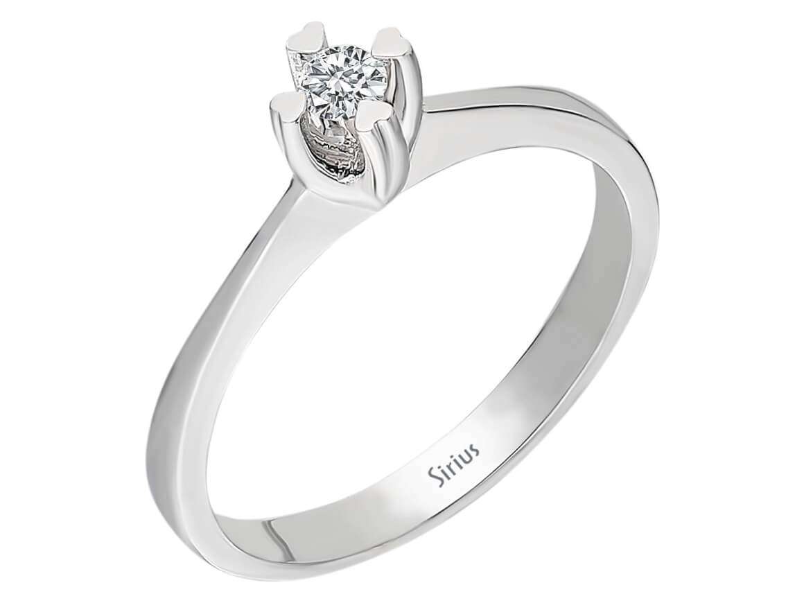 Minimalist solitaire ring with 0.09 carat round diamond, 8 carat white gold