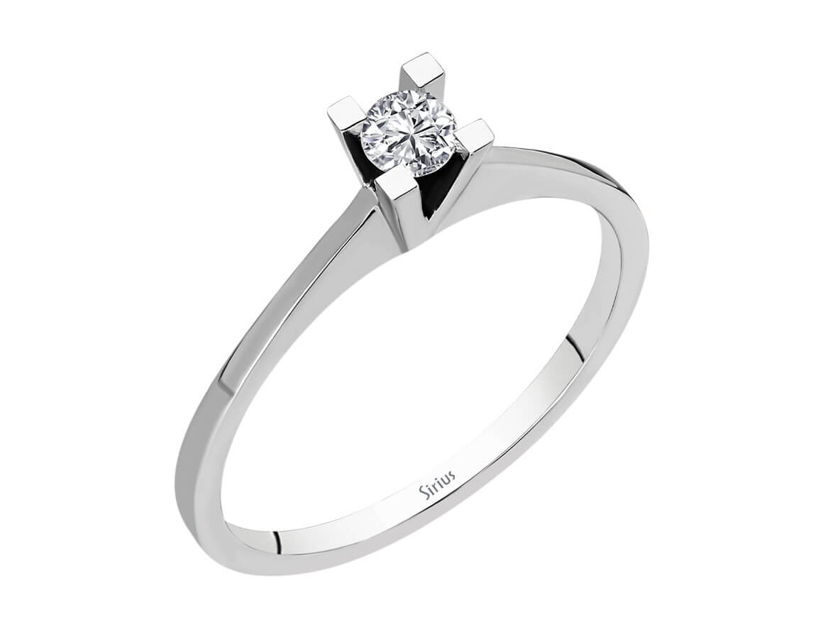 Elegant white gold solitaire ring with 0.10 carat diamond