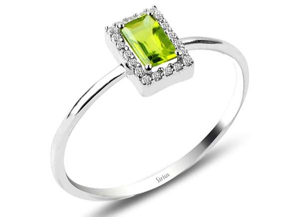 8K white gold ring with 20 round diamonds (0.08 carat) and 1 peridot baguette (0.36 carat)