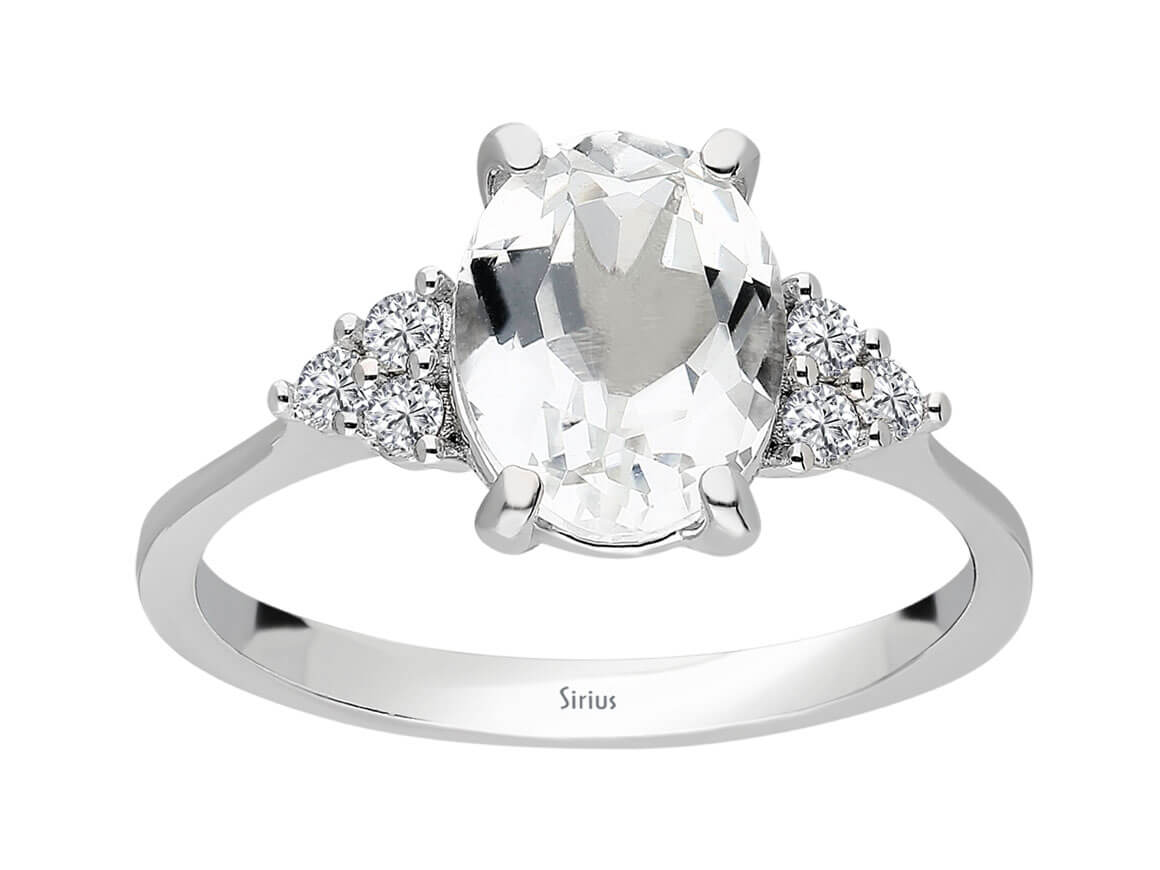 Bague brillante en diamant et topaze blanche avec taille ovale