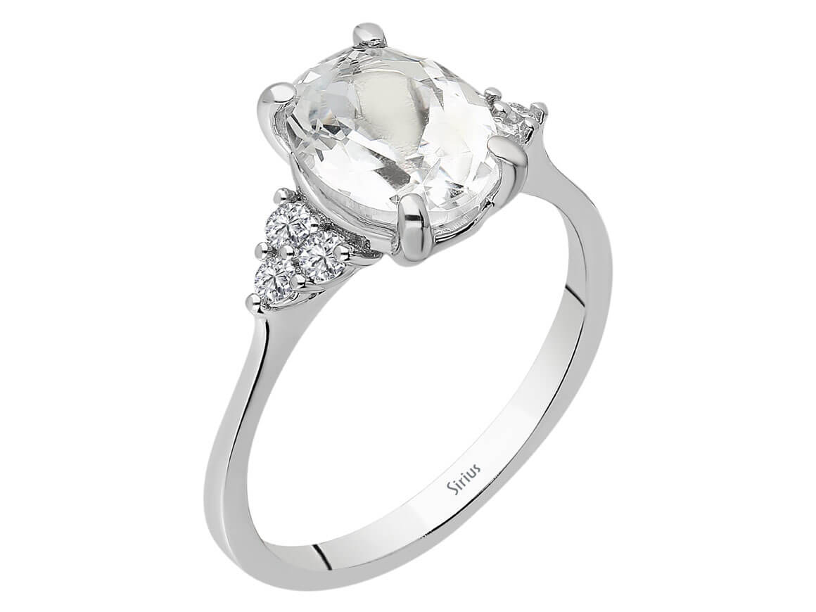Bague brillante en diamant et topaze blanche avec taille ovale