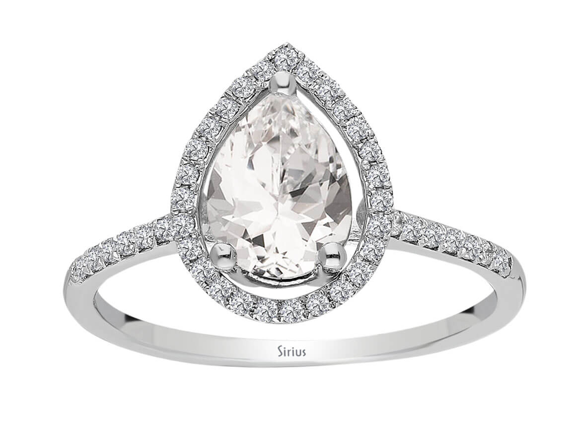 Radiant diamond and white topaz ring with pear cut